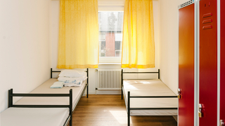 Mehrere Betten in einem Zimmer